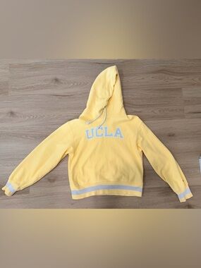 Champion Women’s UCLA Hoodie in Soft Yellow with Gray Trim